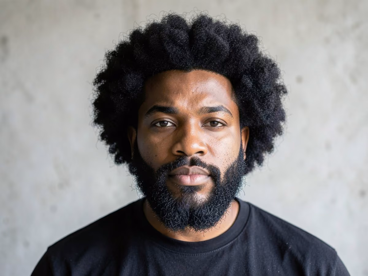 Man with a picked out afro haircut