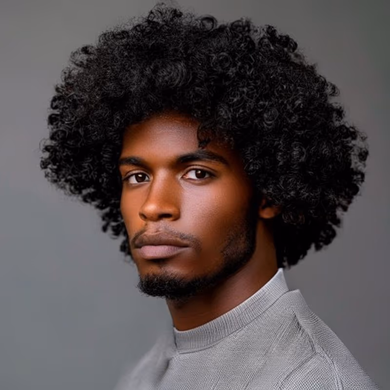 Curly Afro hairstyle for men 2026 — Afro variation, best for Looser curl patterns (3B–4A), modern barbering by Master Stylist Jessica Hamilton