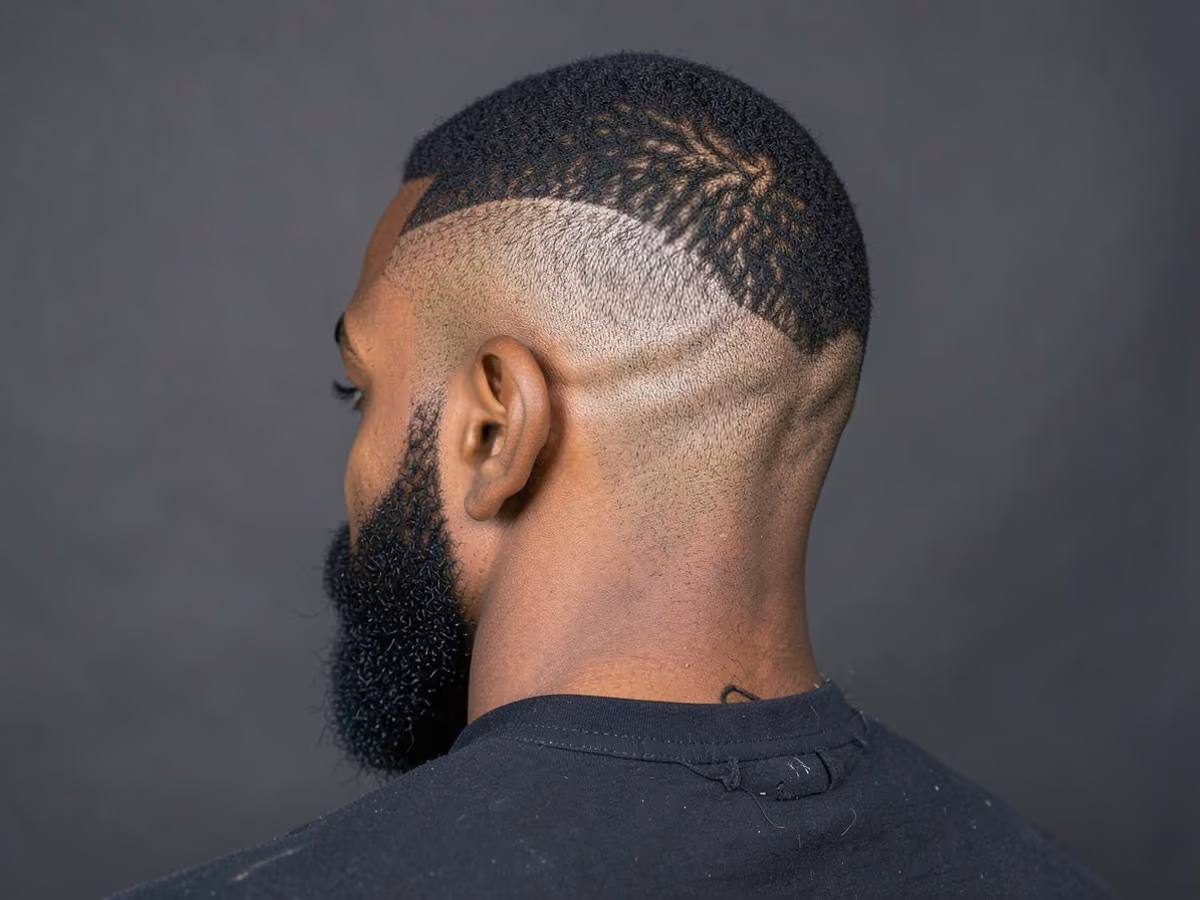 Man with a drop fade back of head
