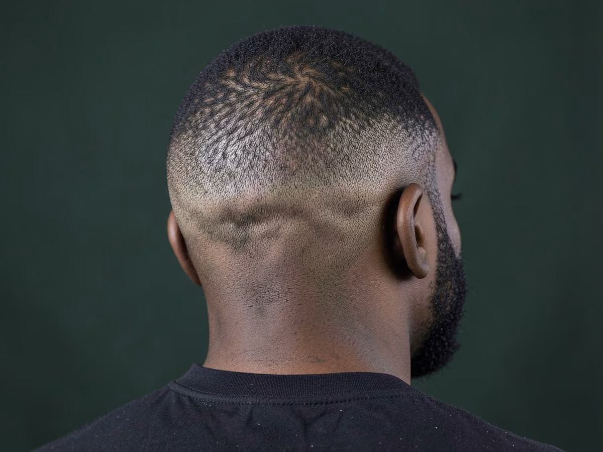 Man with a faded nape haircut