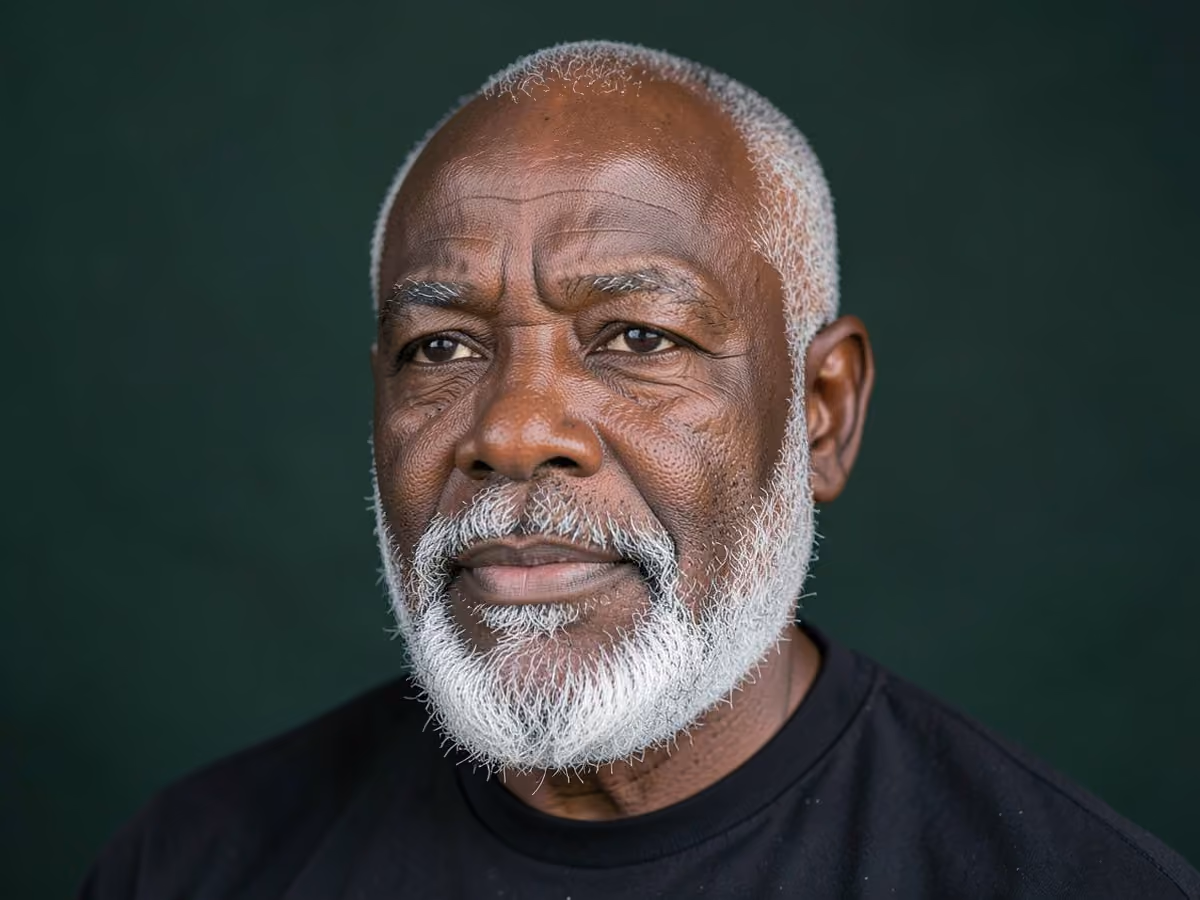 Man with a bald with gray beard haircut