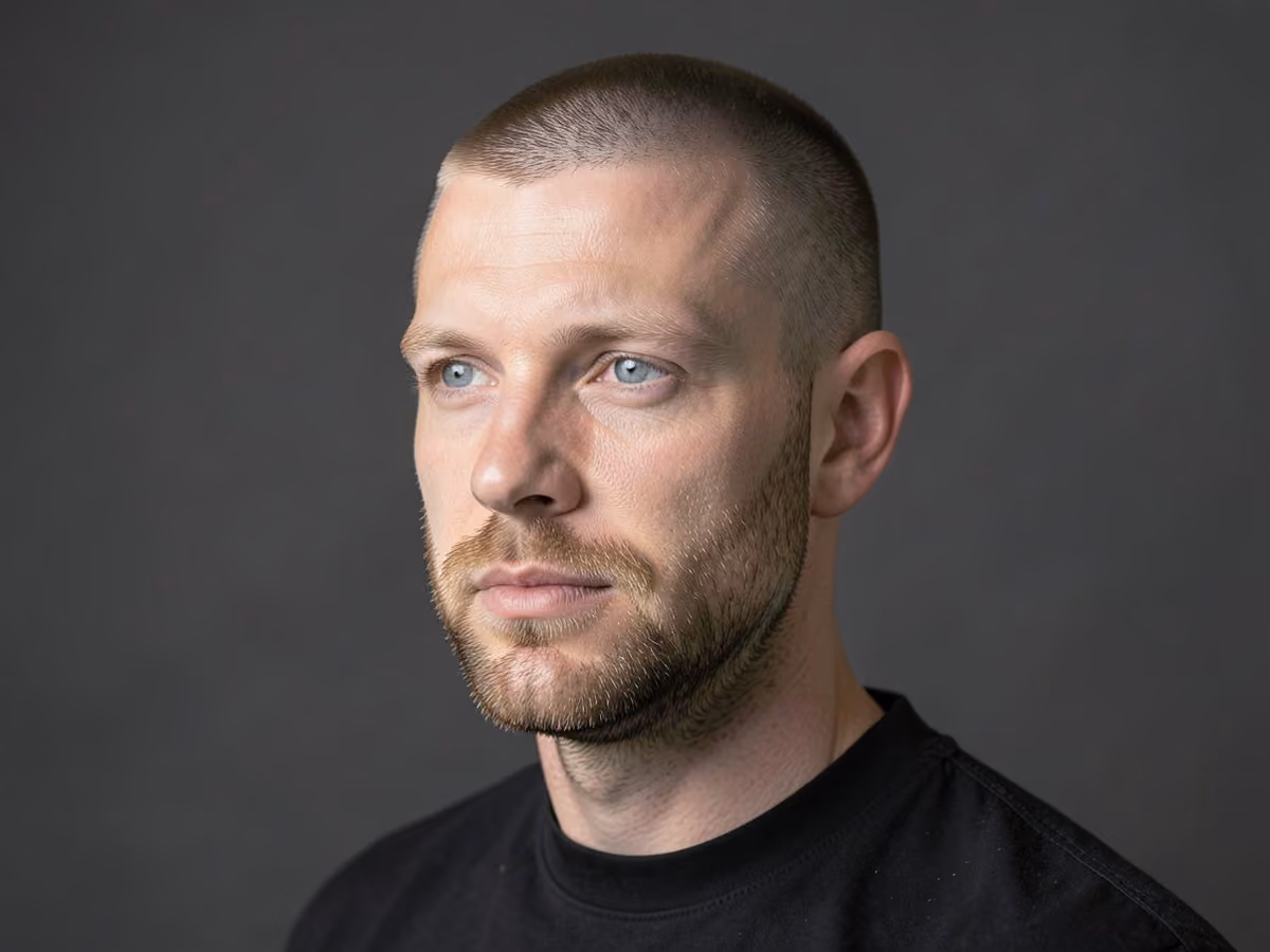 Man with a buzz cut with stubble