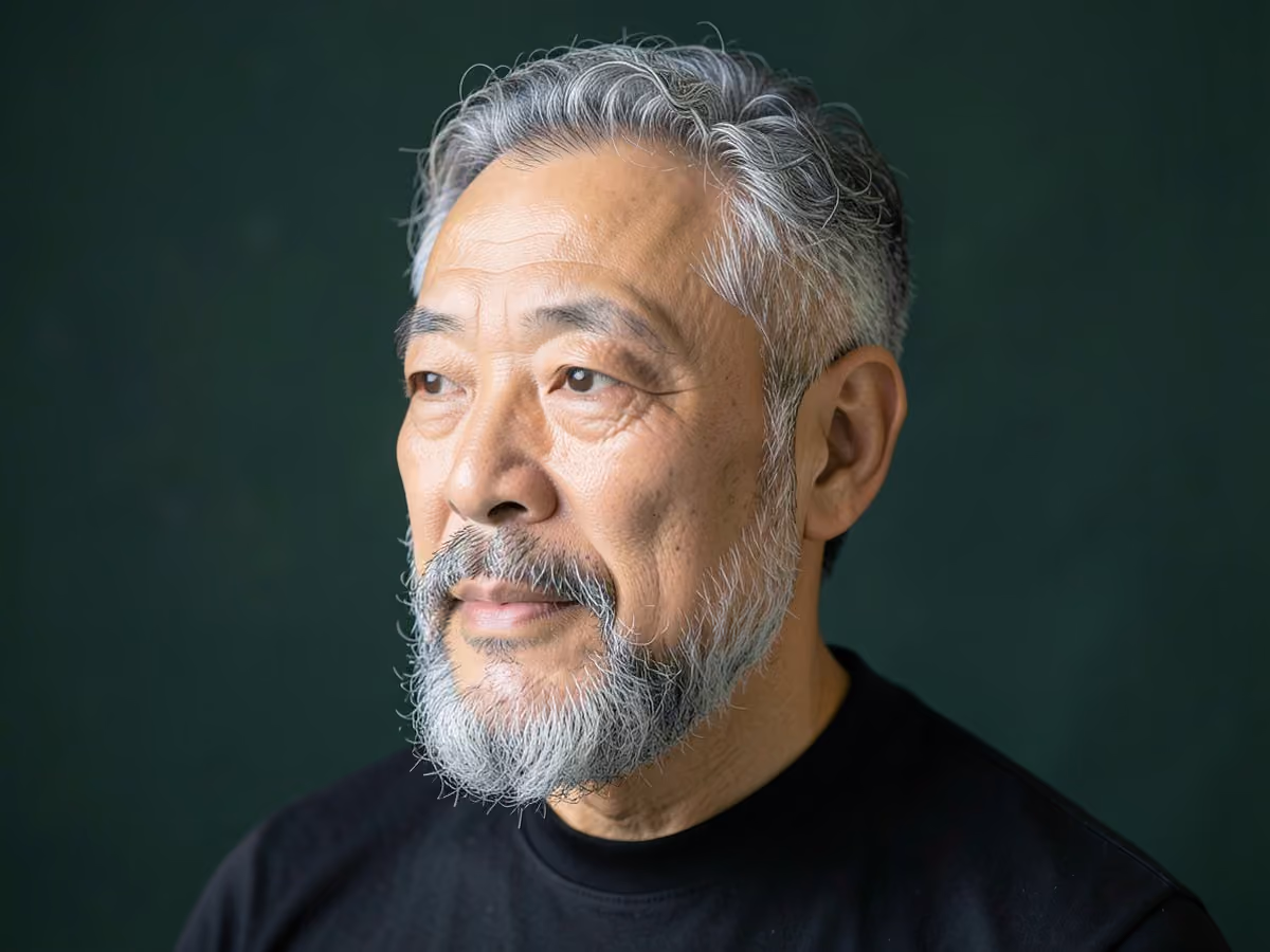 Man with a curly beard fade