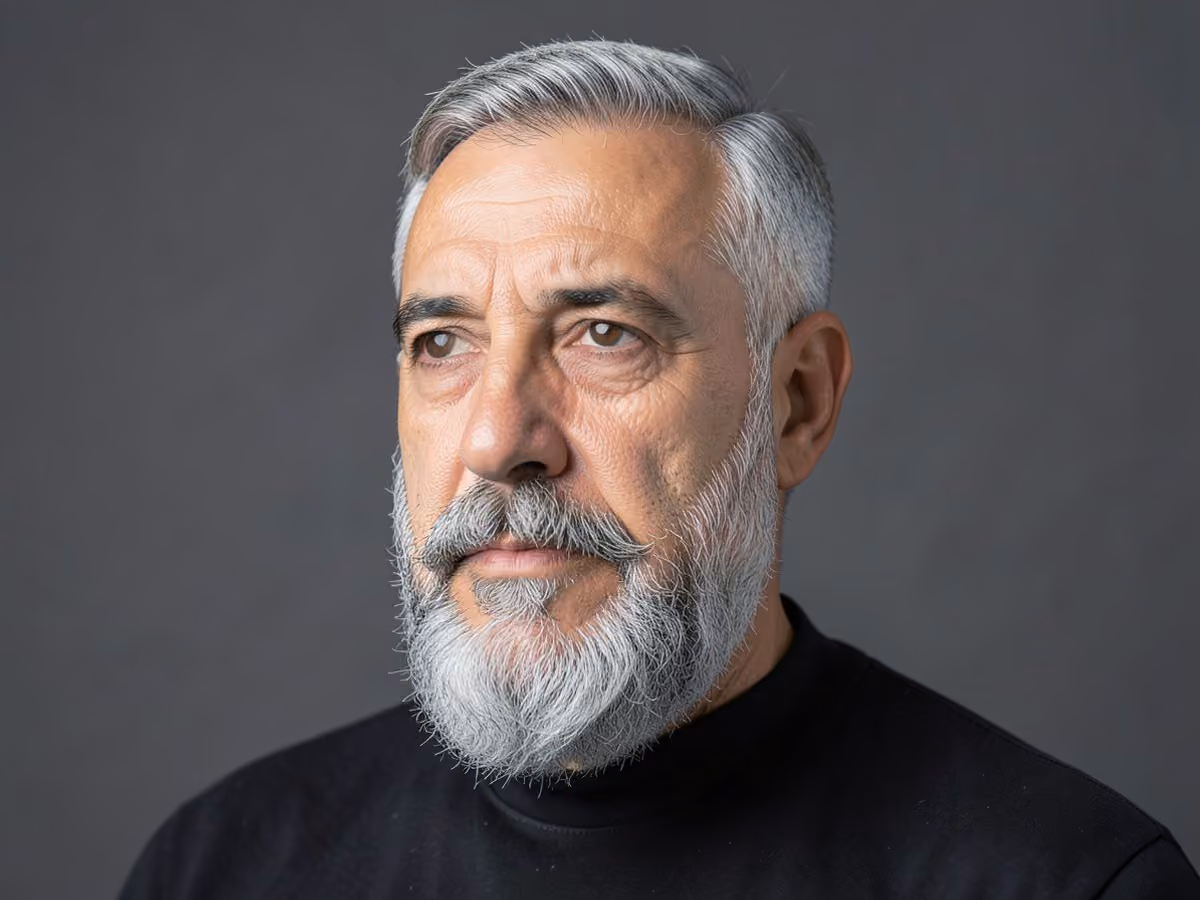 Man with a faded verdi beard