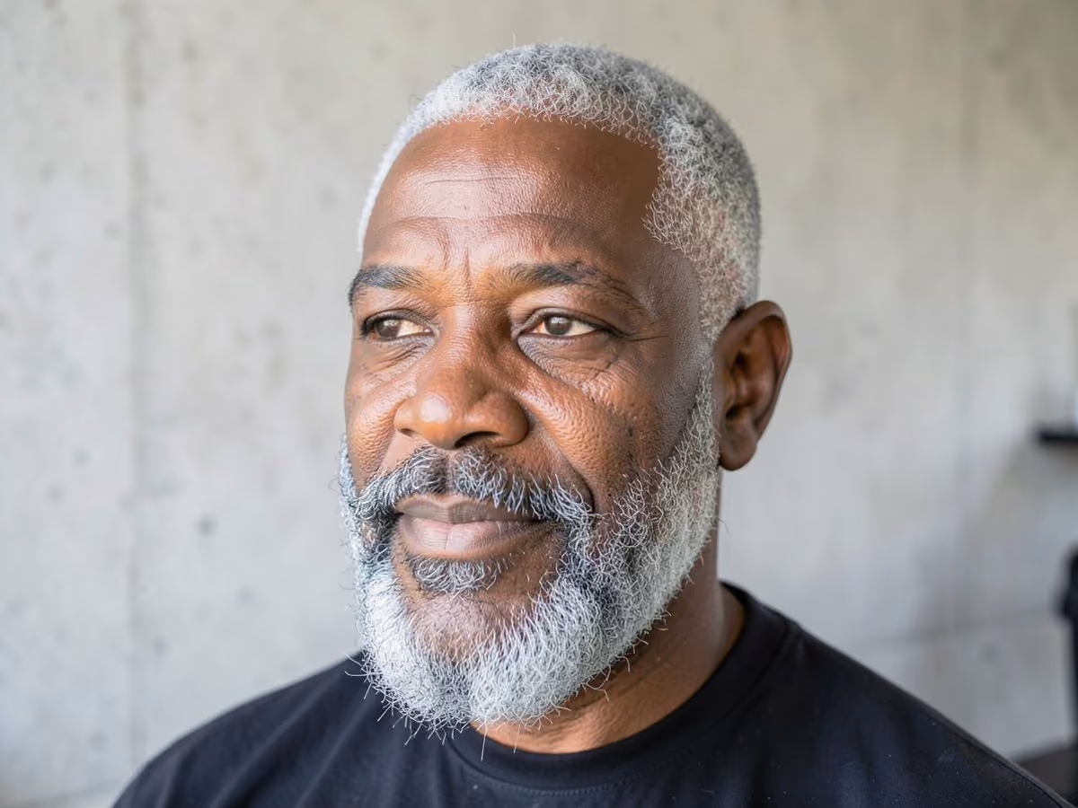 Man with a faded coily beard