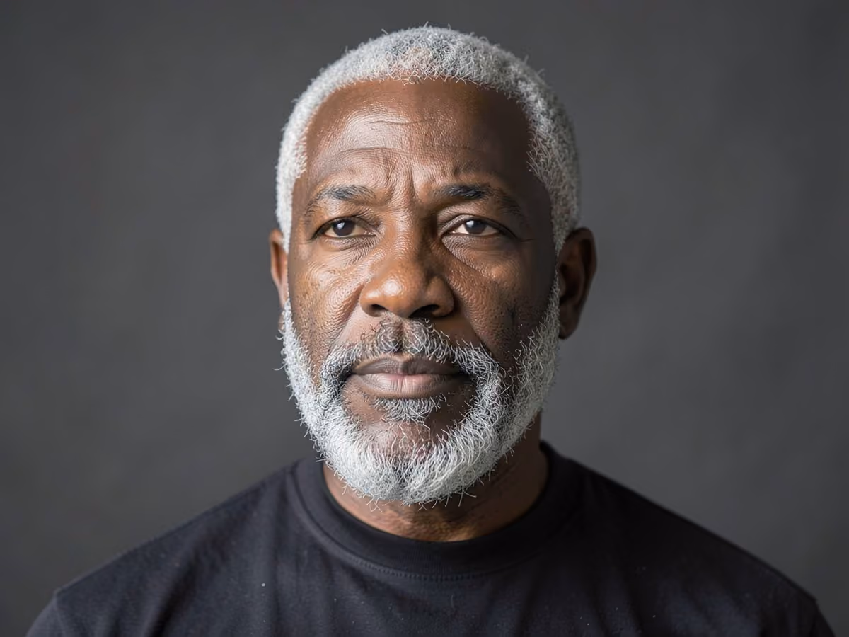 Man with a gray beard for black men haircut