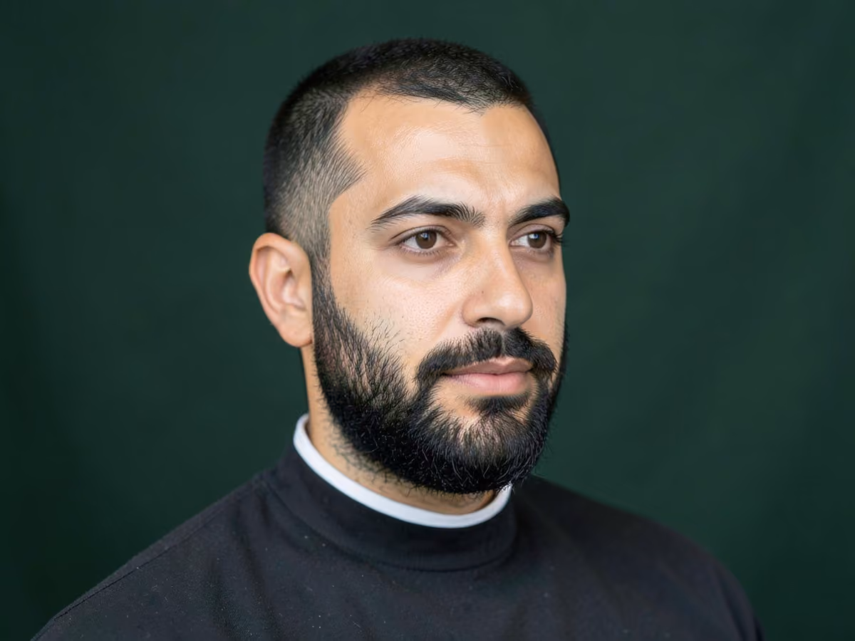 Man with a beard for oval face haircut