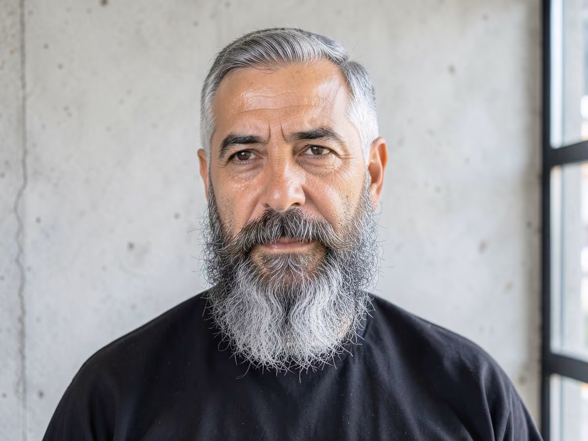 Man with a chin curtain beard haircut
