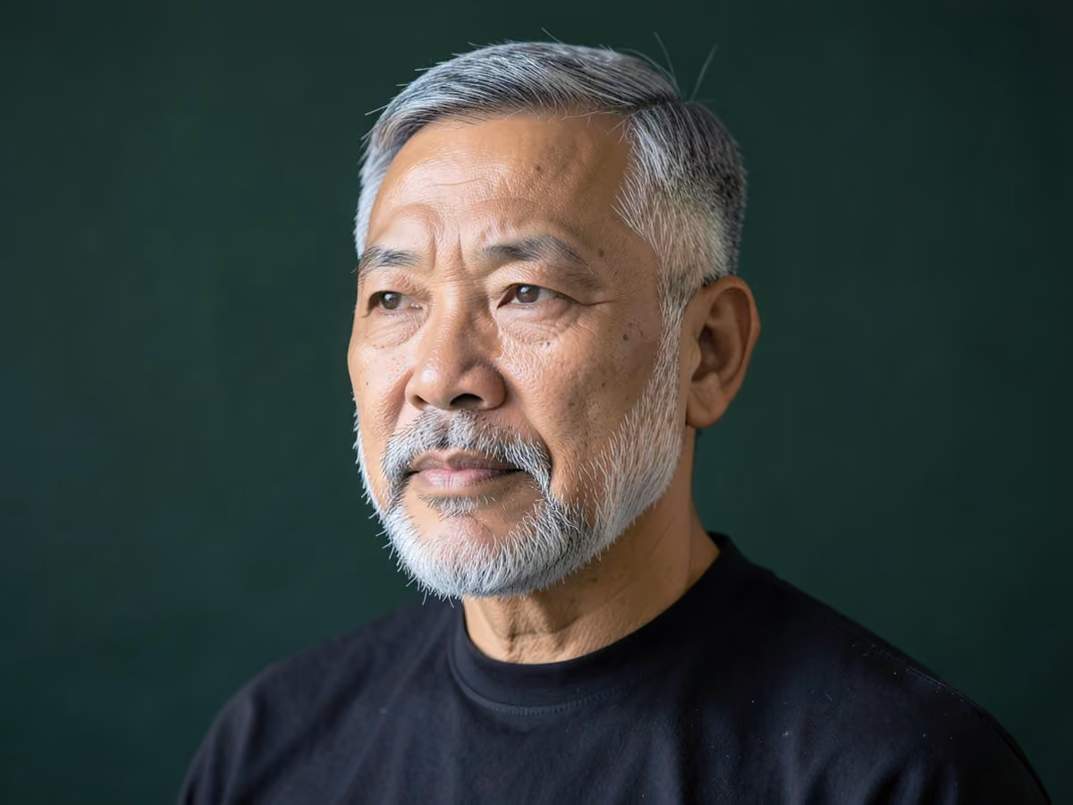 Man with a gray short beard haircut