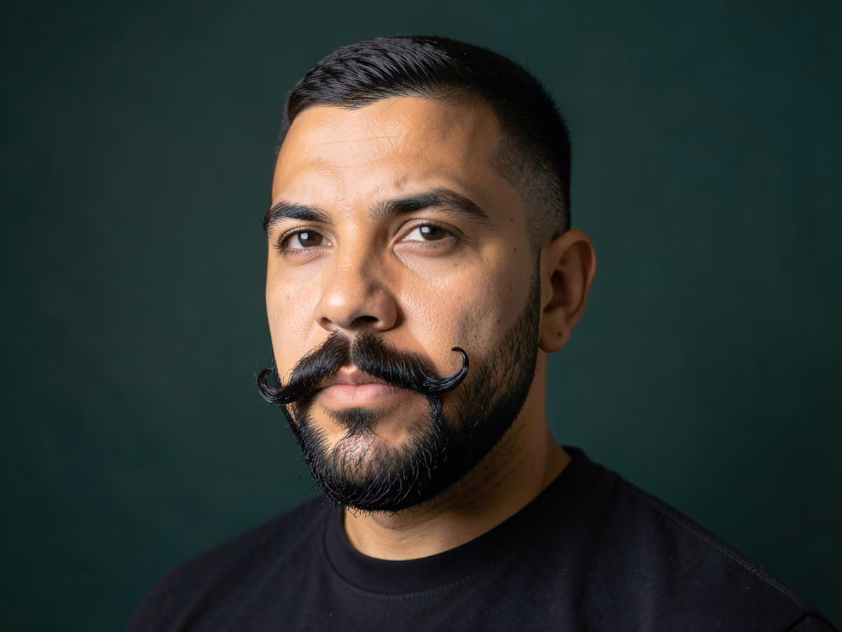 Man with a handlebar beard haircut