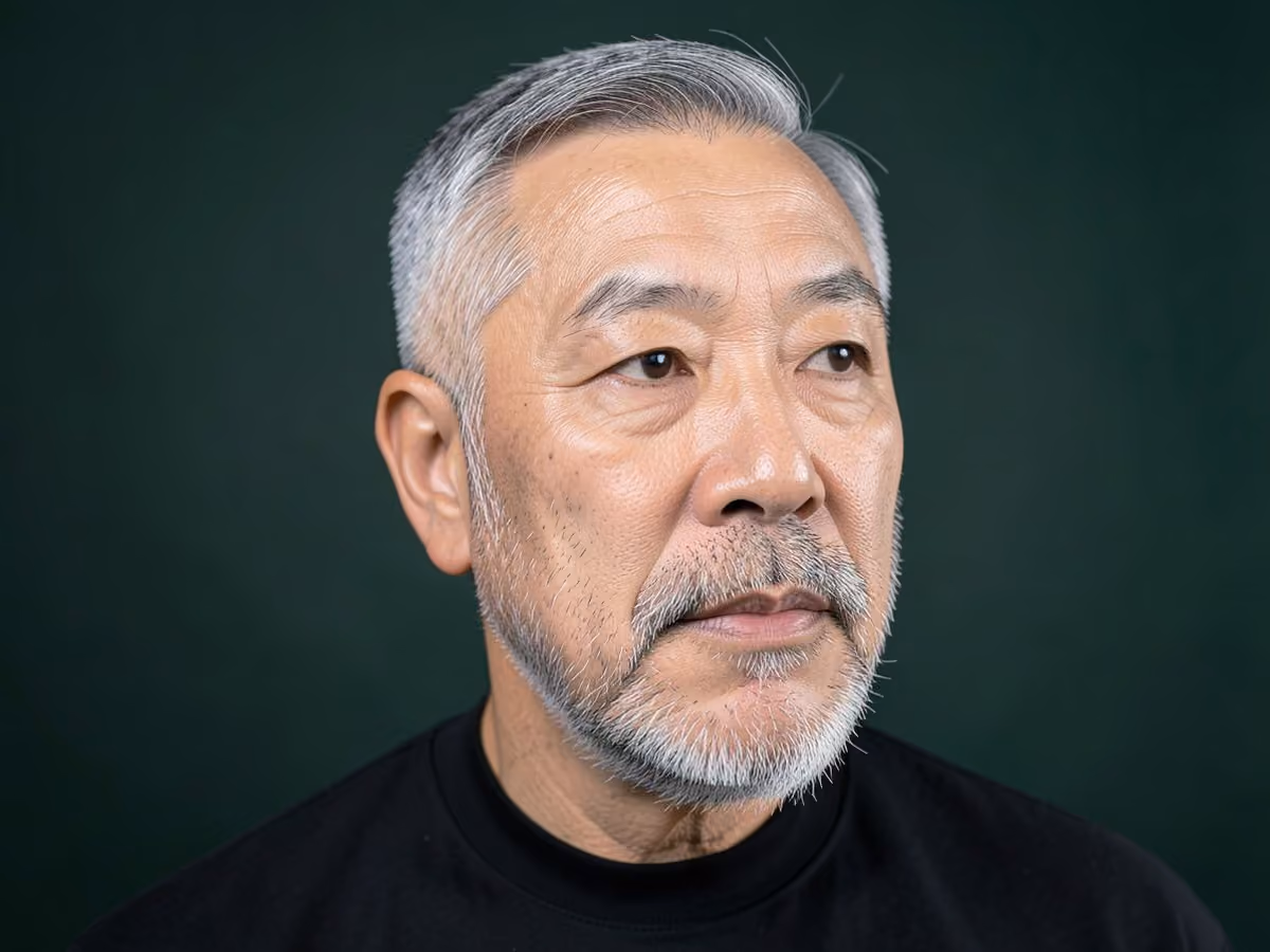 Man with a heavy stubble beard haircut