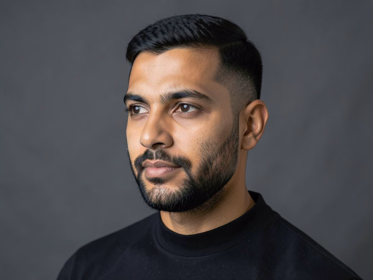Man with a short faded beard