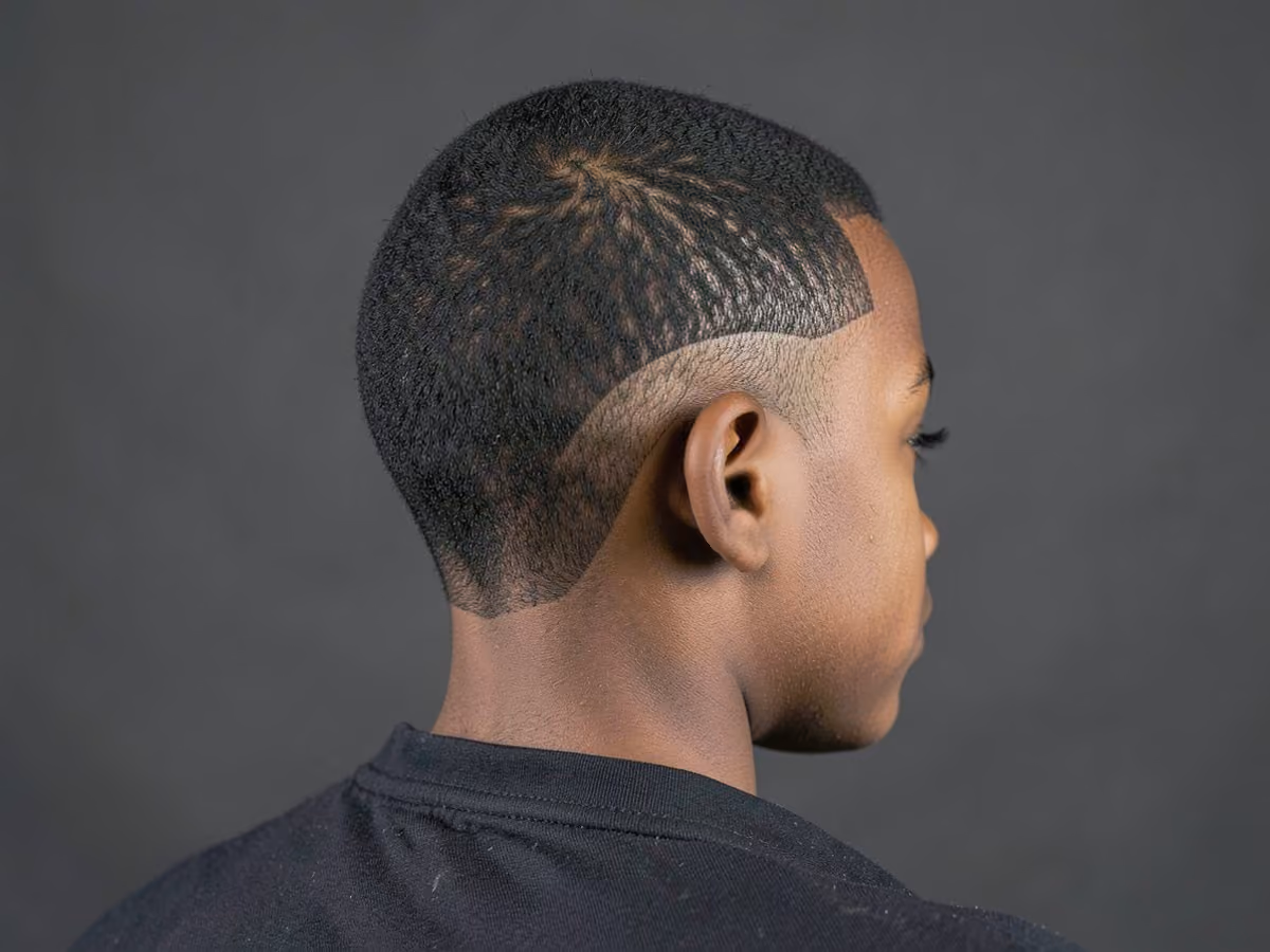 Boy with a black boys burst fade