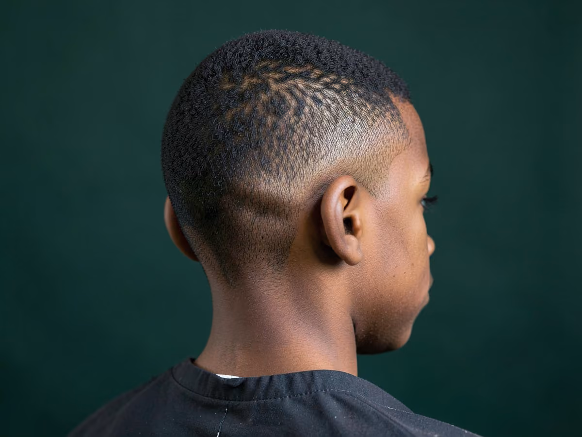 Boy with a black boys buzz cut