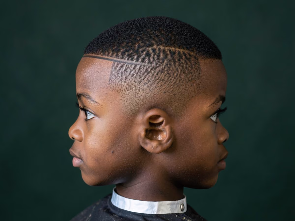 Boy with a black boys hard part