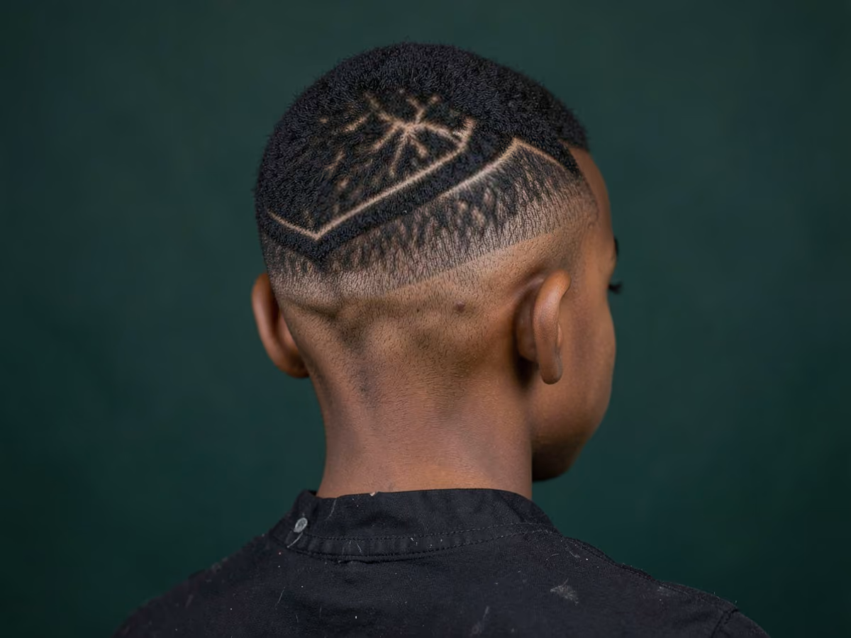 Boy with a black boys zigzag design haircut