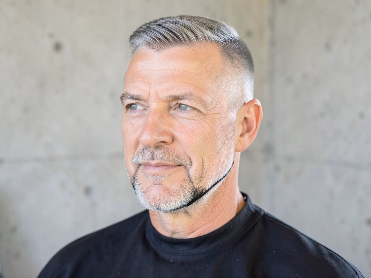 Man with a blowout taper with chin strap haircut