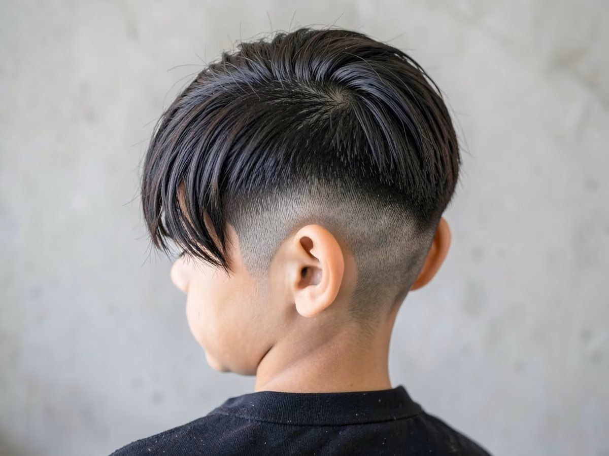 Boy with a boys burst fade mullet