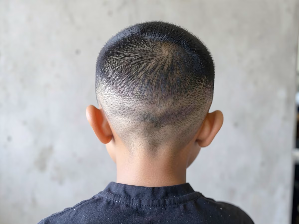 Boy with a boys fade crew cut