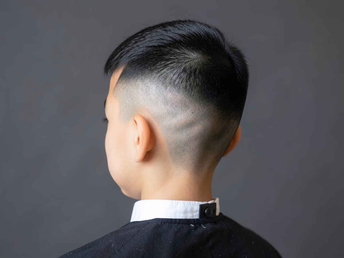 Boy with a boys fade side part