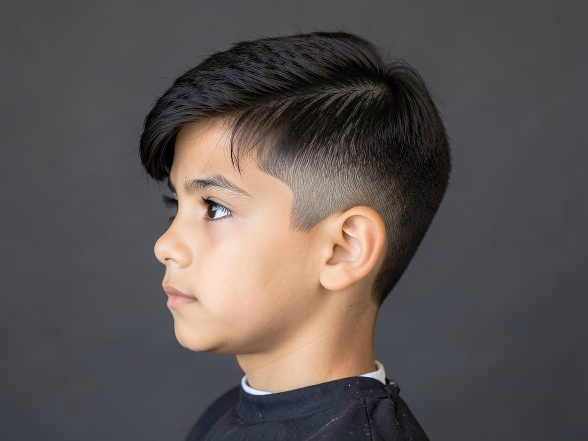 Boy with a boys fade with curtains