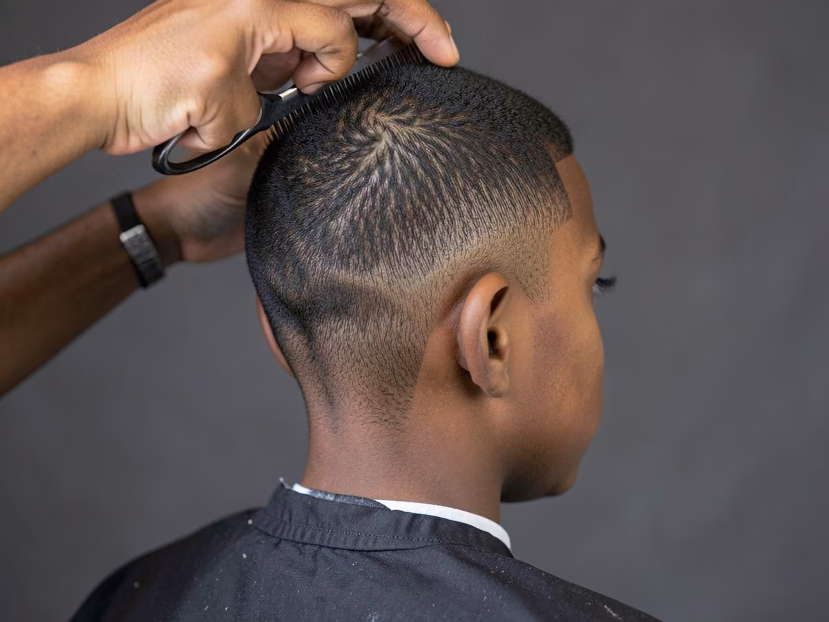 Boy with a boys scissor fade