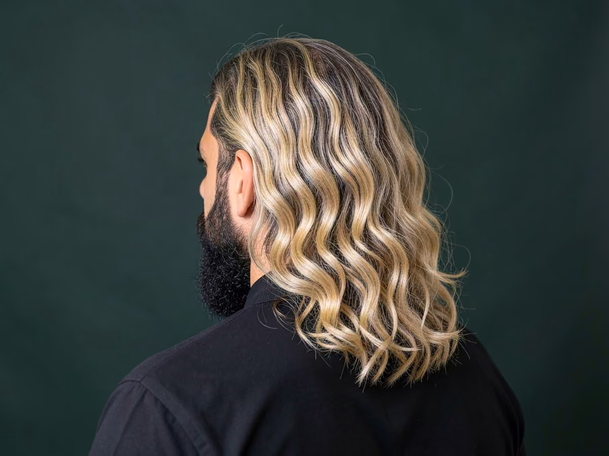 Man with a brad pitt troy hair