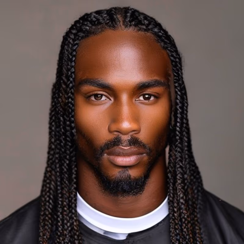 Knotless Box Braids hairstyle for men 2026 — Braids for Men variation, best for Comfort and a gentler hairline, modern barbering by Master Stylist Jessica Hamilton