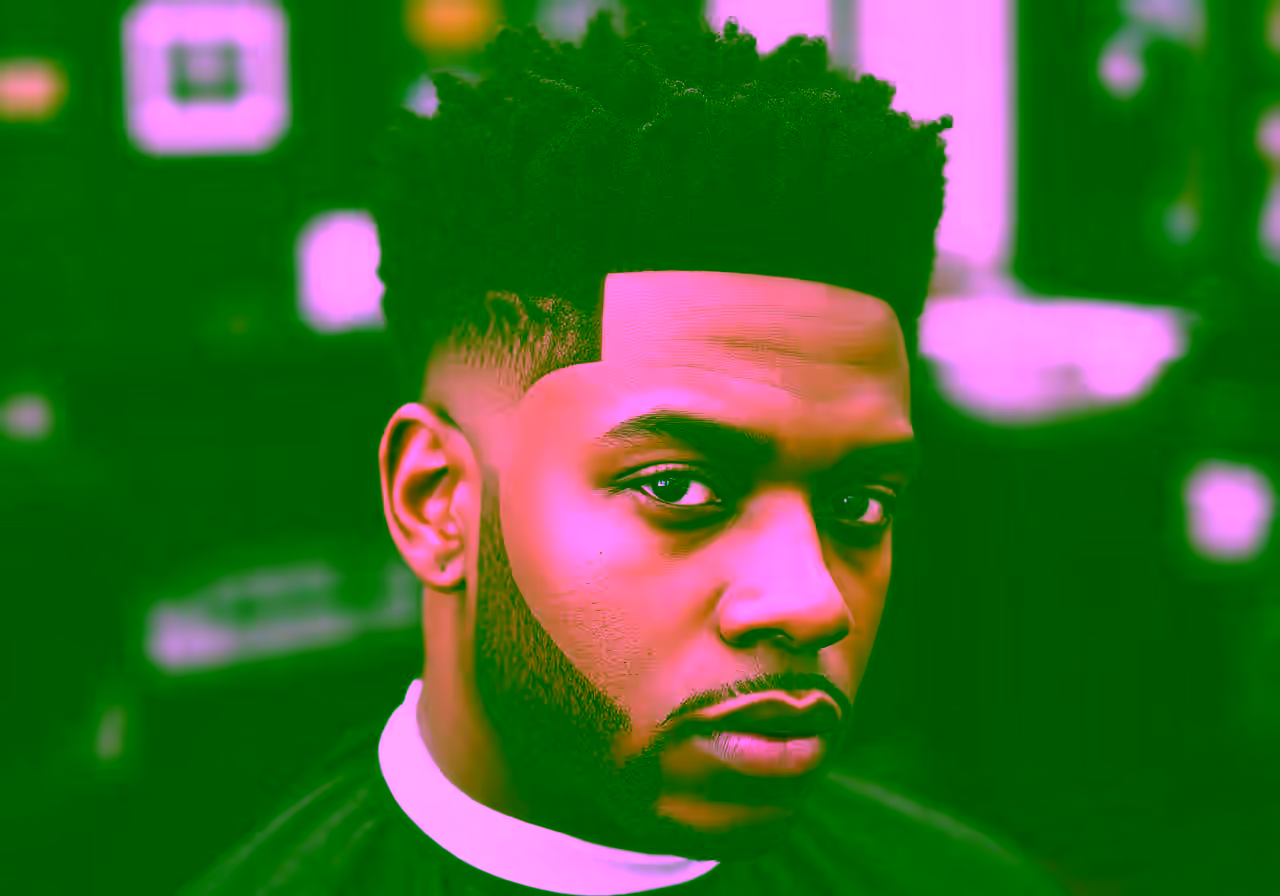 Burst Fade Black Male hairstyle for men 2026 — burst fade variation, best for oval, square faces + curly/coily hair, modern barbering by Master Stylist Jessica Hamilton