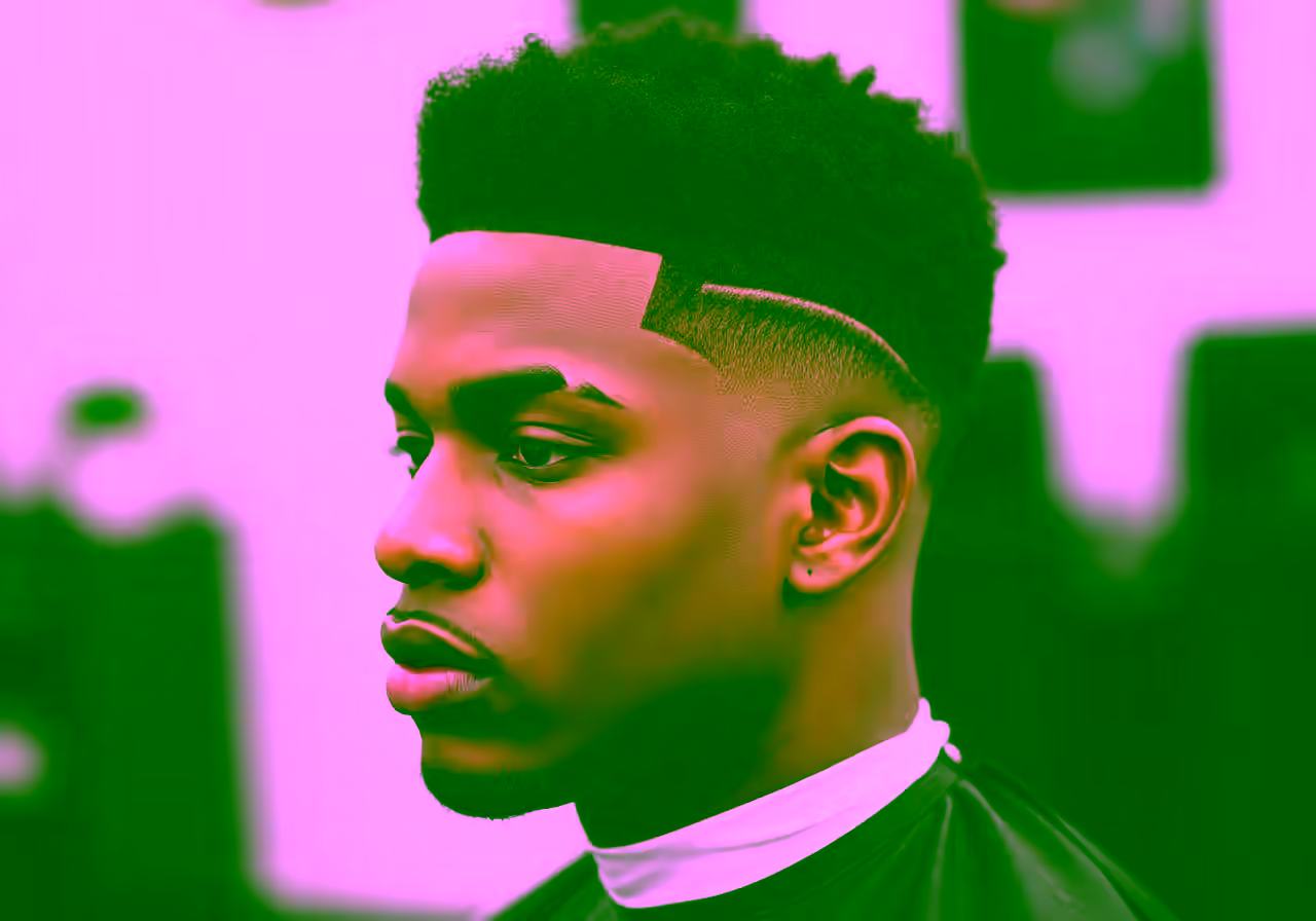 Burst Fade Blowout hairstyle for men 2026 — burst fade variation, best for oval, round faces + straight/wavy hair, modern barbering by Master Stylist Jessica Hamilton