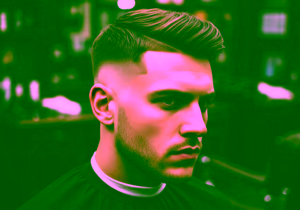 Burst Fade Disconnected hairstyle for men 2026 — burst fade variation, best for creative/edgy styles + thick hair, modern barbering by Master Stylist Jessica Hamilton