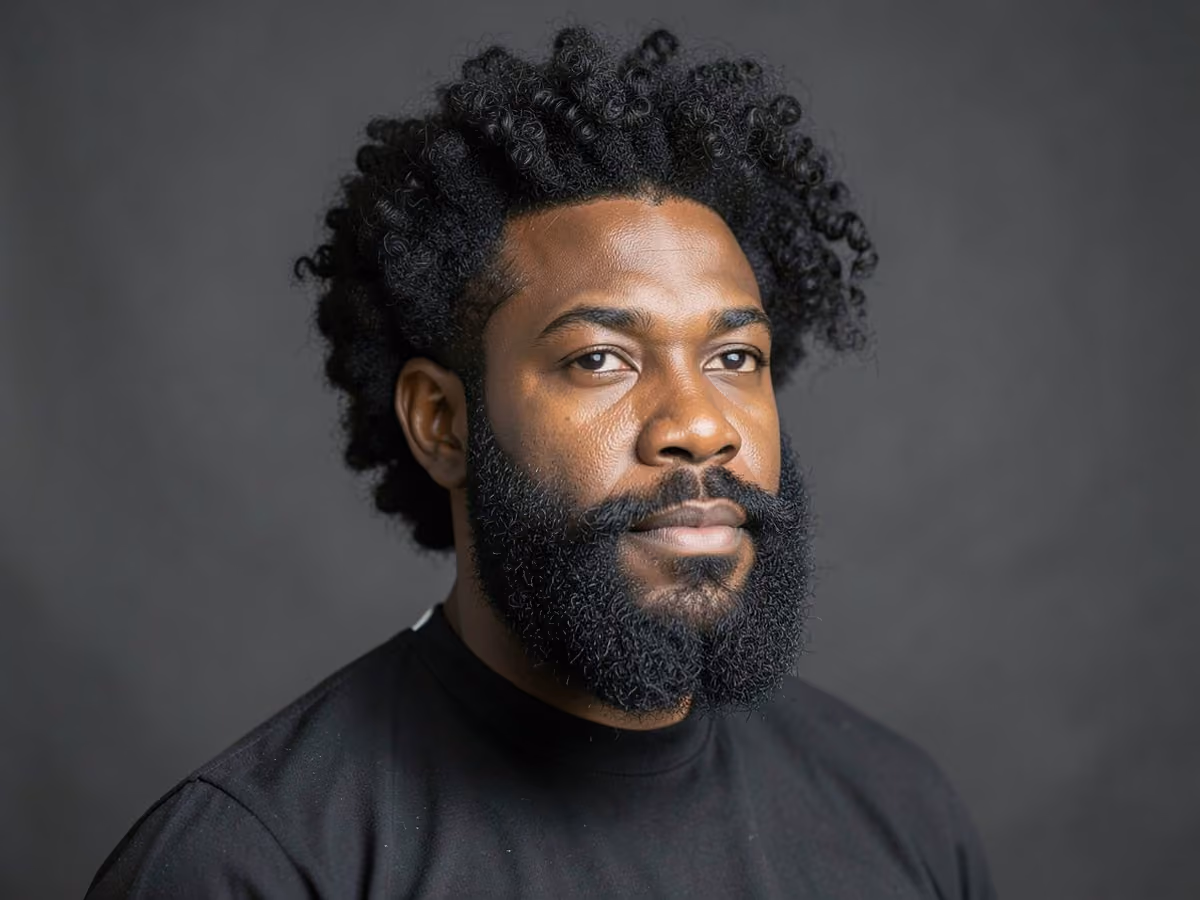 Man with a mohamed salah curly hair