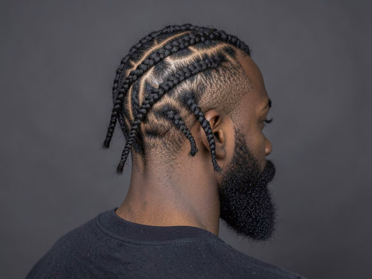 Man with a halo cornrows haircut