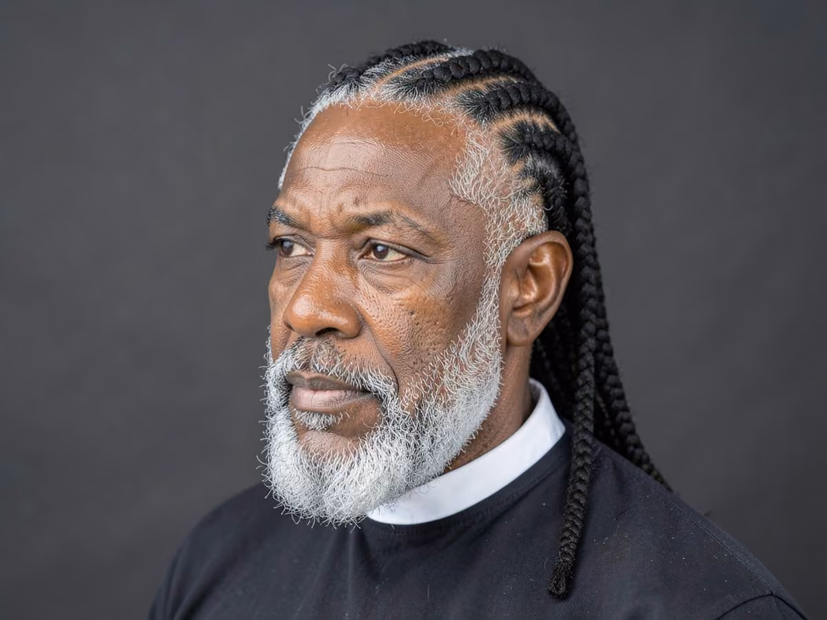 Man with a jumbo cornrows haircut