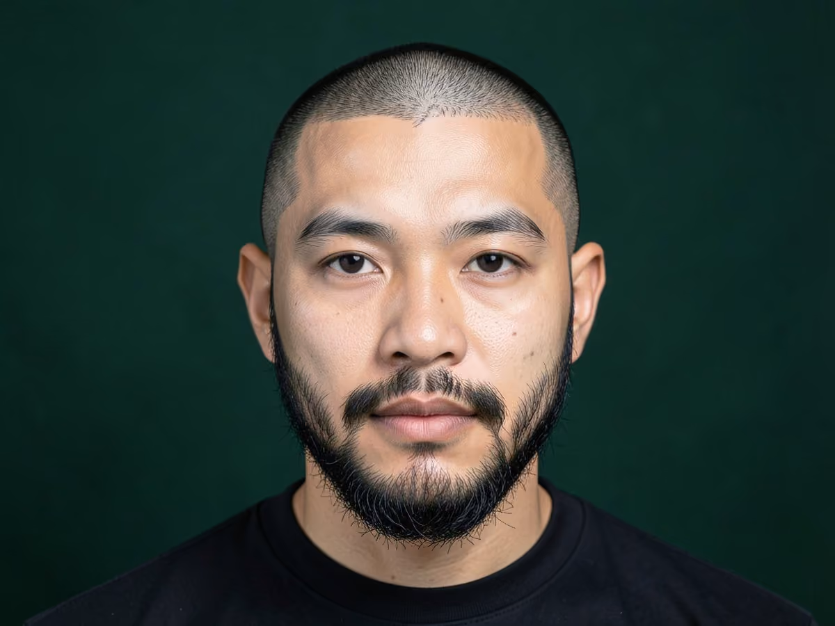 Man with a cristiano ronaldo buzz cut