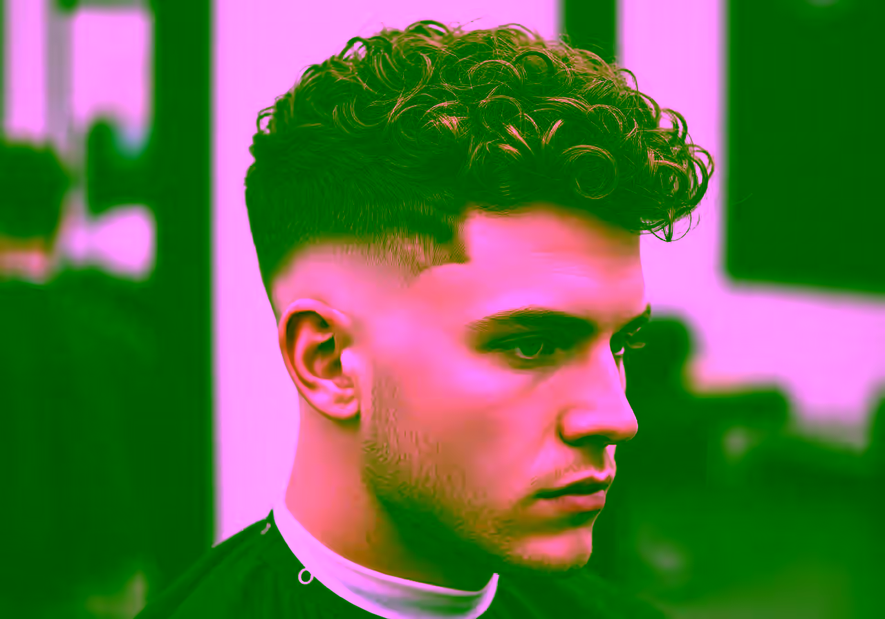 Curly Drop Fade hairstyle for men 2026 — curly hairstyles variation, best for all faces + 3b–4a curls, modern barbering by Master Stylist Jessica Hamilton