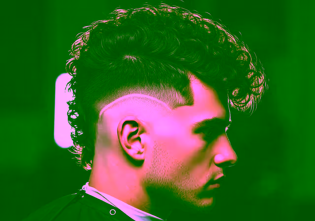 Curly Faux Hawk hairstyle for men 2026 — curly hairstyles variation, best for oval, round faces + thick curls, modern barbering by Master Stylist Jessica Hamilton