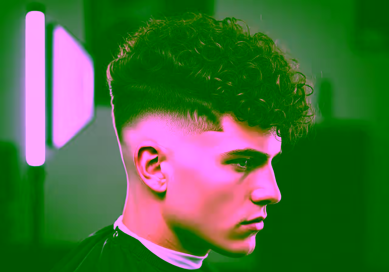 Curly Skin Fade hairstyle for men 2026 — curly hairstyles variation, best for bold looks + all faces, modern barbering by Master Stylist Jessica Hamilton