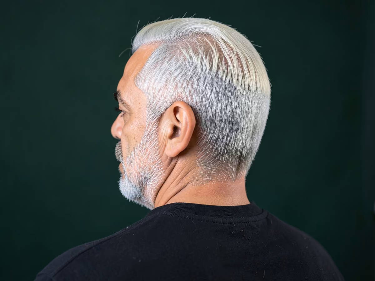 Man with a david beckham blond highlights haircut