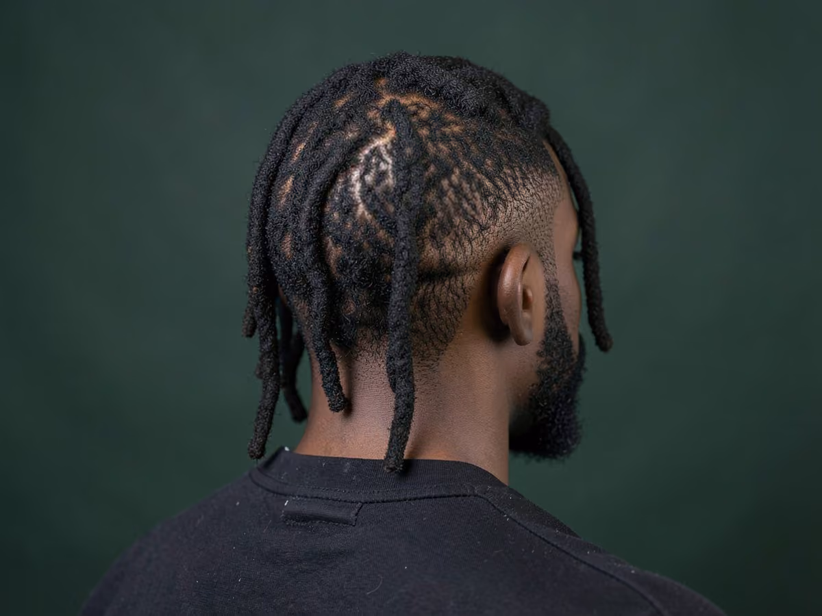 Man with a chin length locs haircut