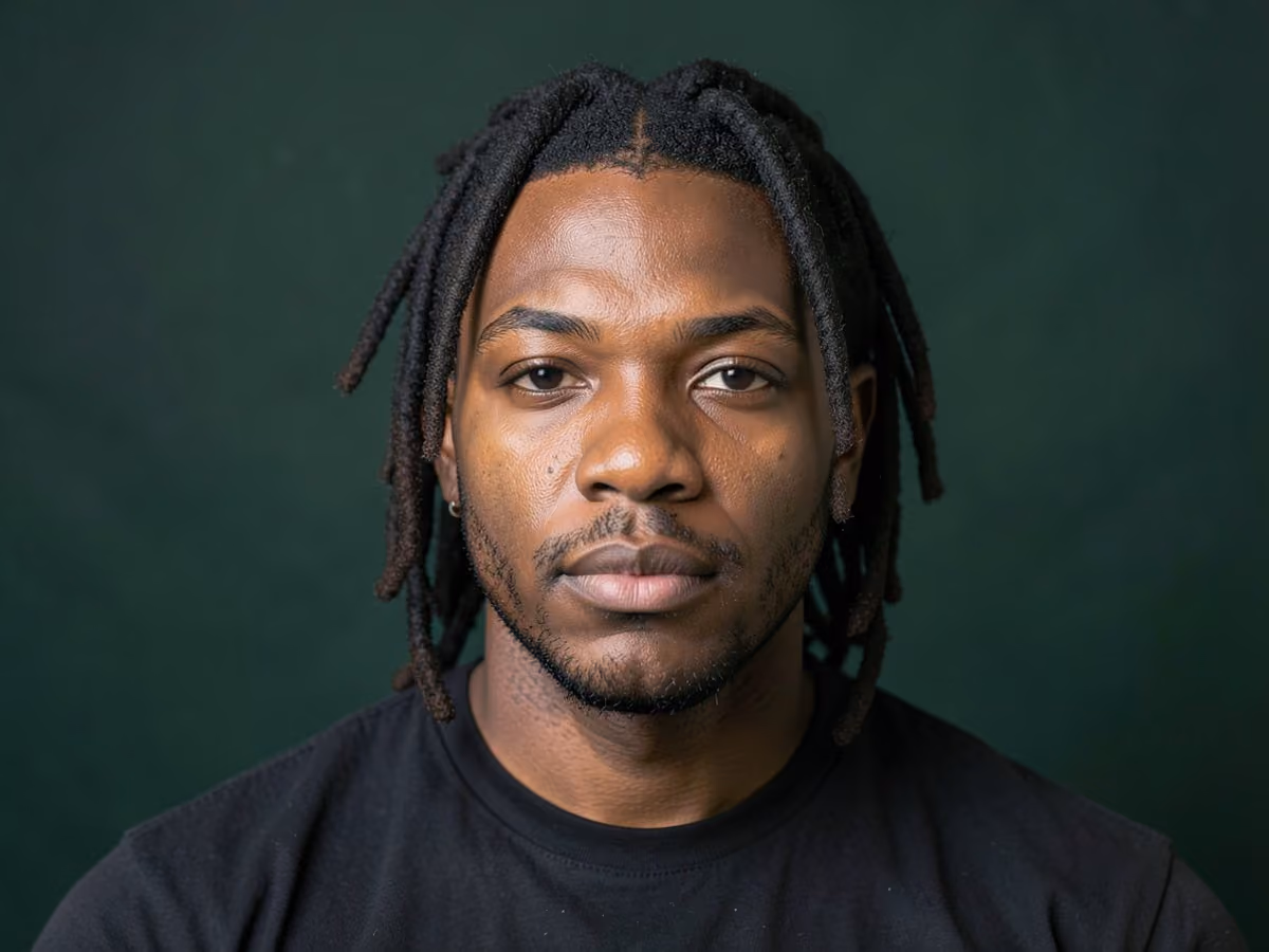 Man with a medium freeform dreads haircut