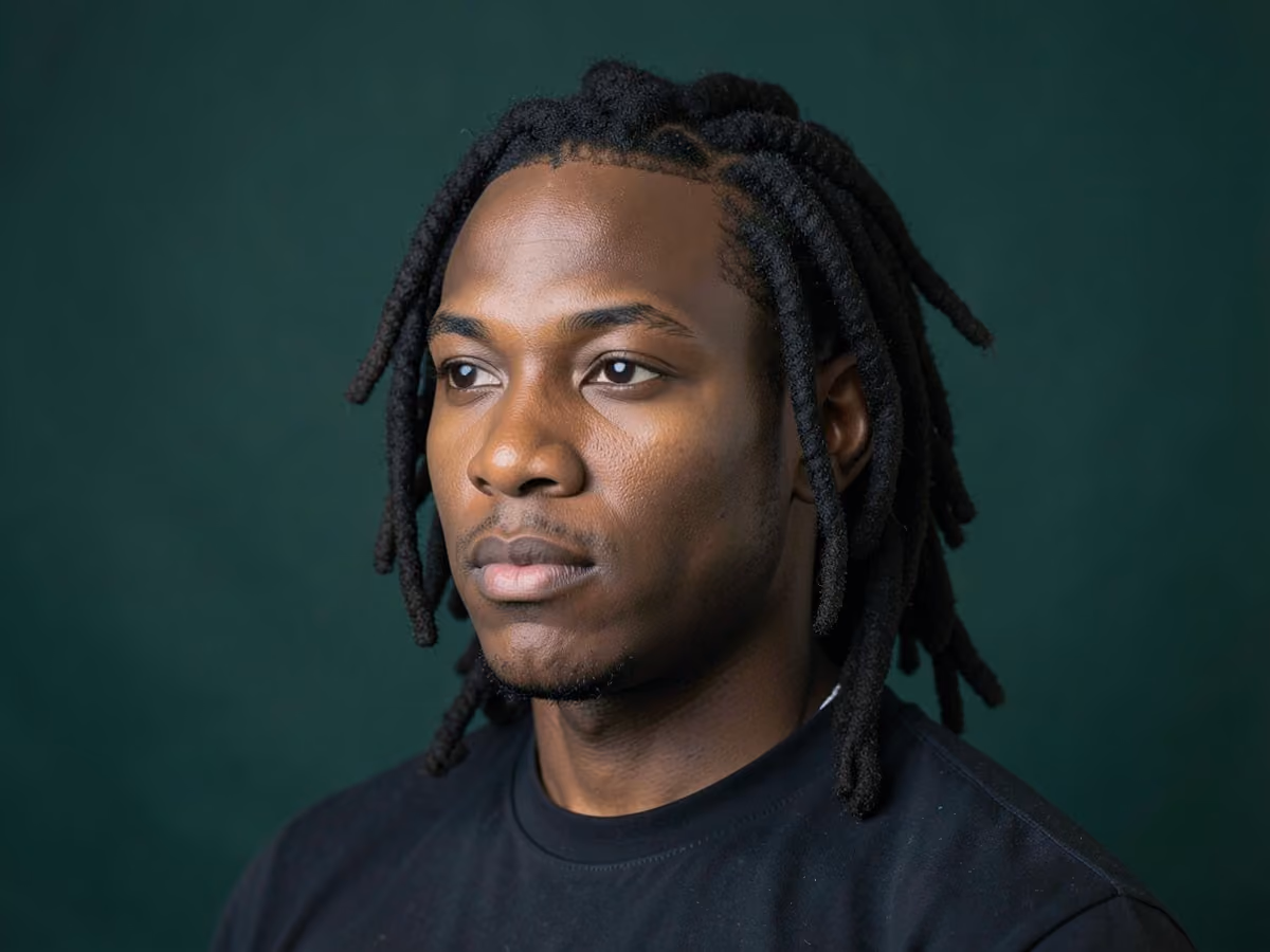 Man with a medium size locs haircut