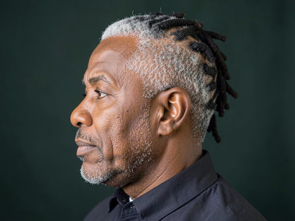 Man with a professional short locs haircut