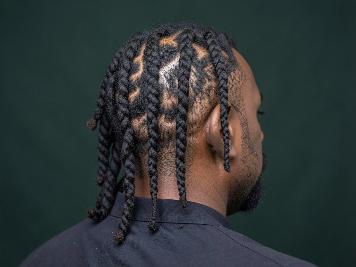 Man with a rope twist locs haircut