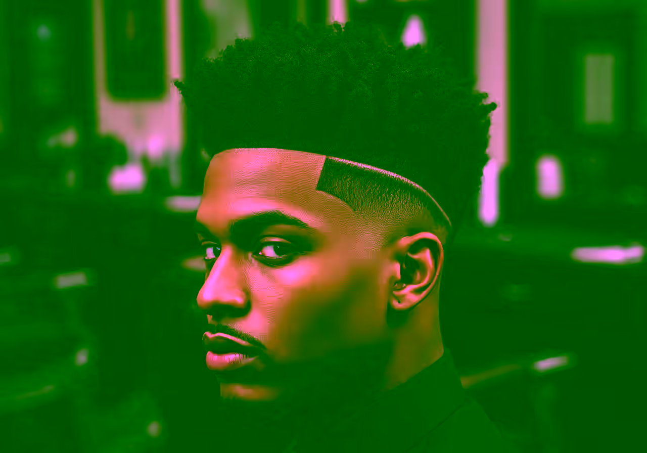 Drop Fade Black Male hairstyle for men 2026 — drop fade variation, best for oval, square faces + curly/coily hair, modern barbering by Master Stylist Jessica Hamilton