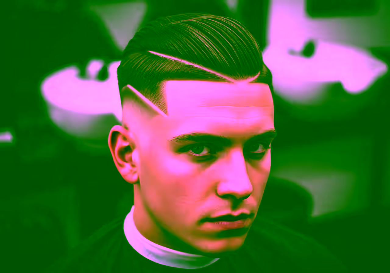 Drop Fade Hard Part hairstyle for men 2026 — drop fade variation, best for professional-bold looks + straight hair, modern barbering by Master Stylist Jessica Hamilton