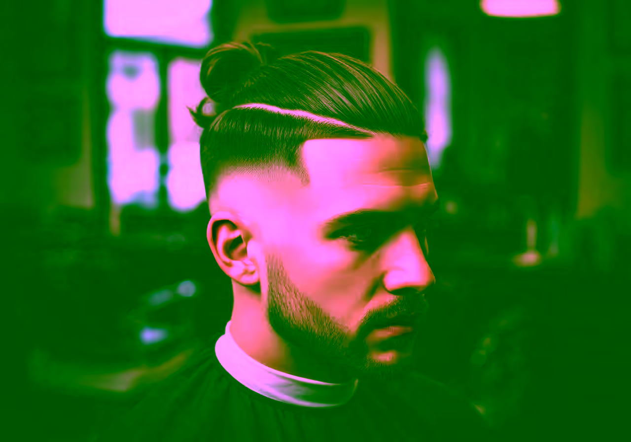 Drop Fade Man Bun hairstyle for men 2026 — drop fade variation, best for all faces + straight/wavy/curly hair, modern barbering by Master Stylist Jessica Hamilton
