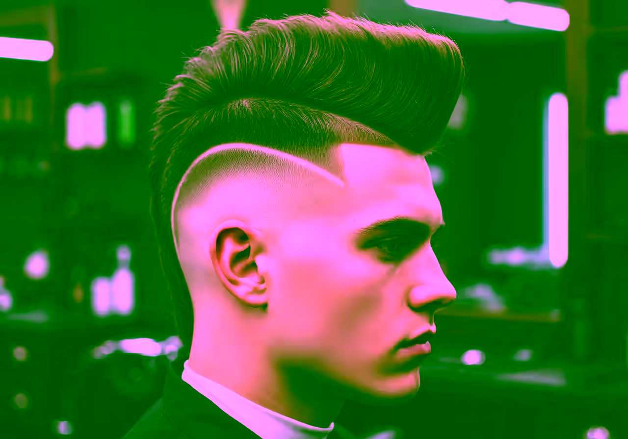 Drop Fade Mohawk hairstyle for men 2026 — drop fade variation, best for oval, round faces + thick/straight hair, modern barbering by Master Stylist Jessica Hamilton