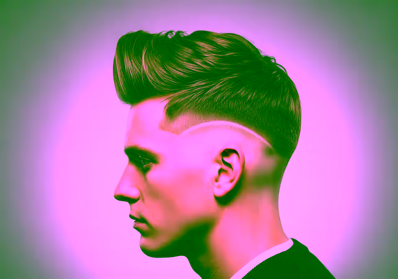 Drop Fade Quiff hairstyle for men 2026 — drop fade variation, best for oval faces + medium-thick hair, modern barbering by Master Stylist Jessica Hamilton