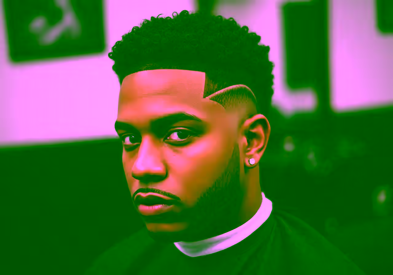 Drop Fade Sponge Twists hairstyle for men 2026 — drop fade variation, best for all faces + coily/curly hair, modern barbering by Master Stylist Jessica Hamilton